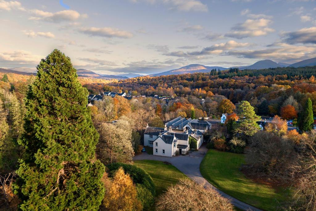 an aerial view of a home in the fall foliage at Spean Lodge in Spean Bridge