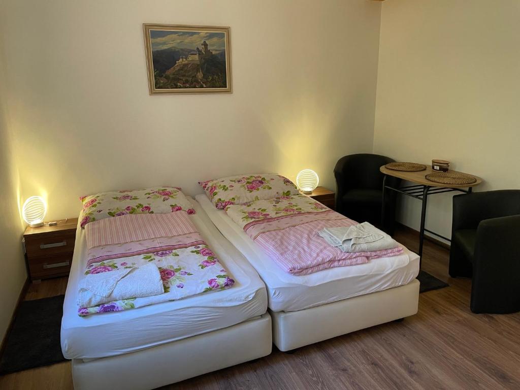 Postel nebo postele na pokoji v ubytování Apartmány Telnice - Medorhof
