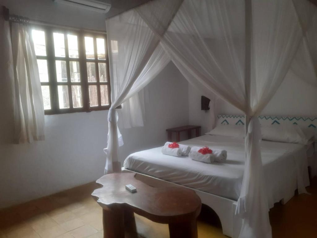 Cama ou camas em um quarto em Residencia La Bussola