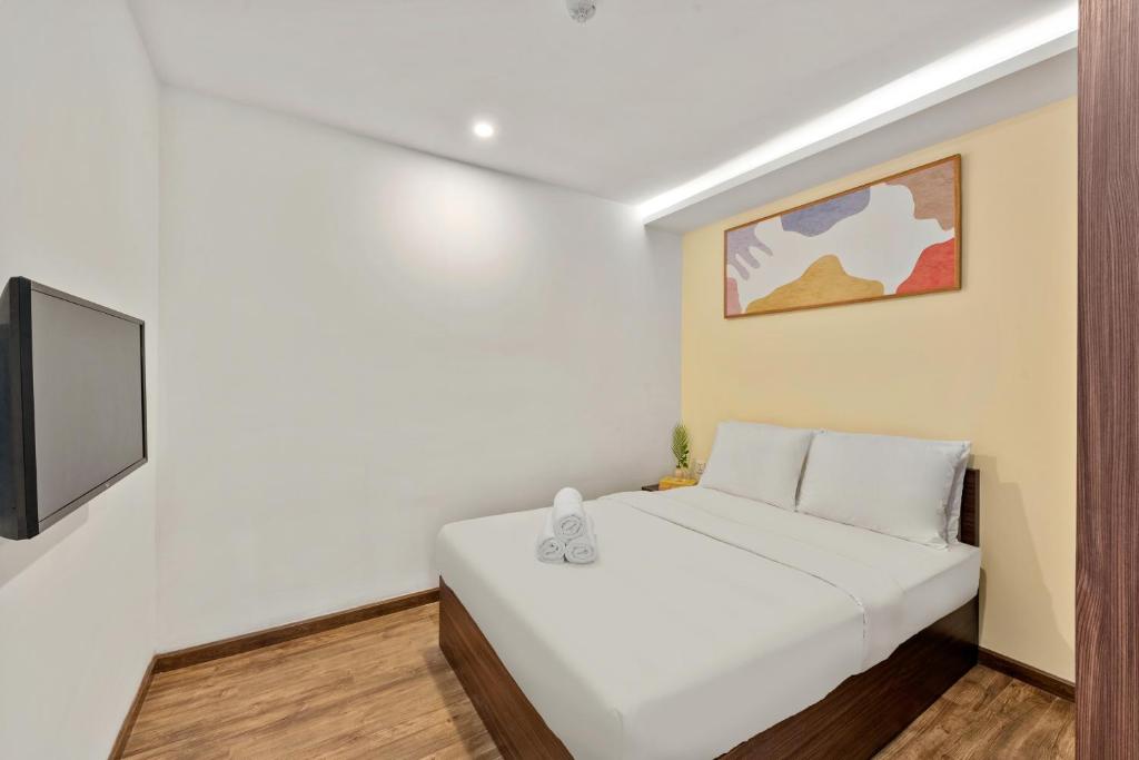 Giường trong phòng chung tại S Lux Apartment Virgo