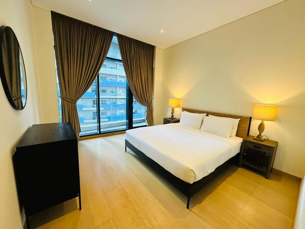 Postel nebo postele na pokoji v ubytování EasyGo - RP Heights 1 Bedroom