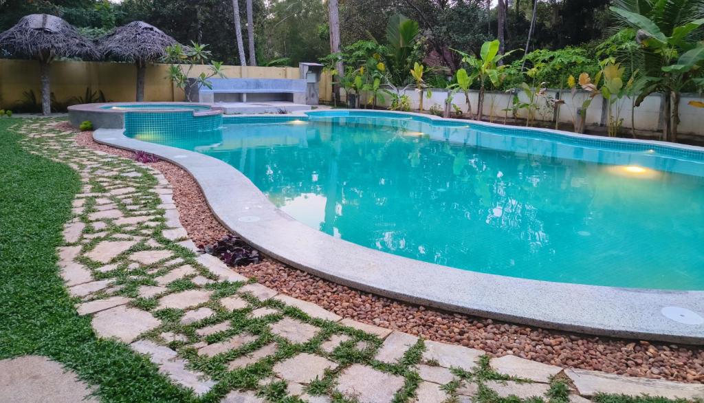 Marari Beach Bungalow Resort Alleppey - Chambre Quadruple Avec Vue Sur Le Jardin