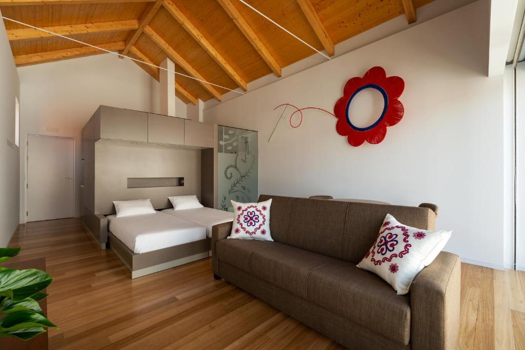 Een bed of bedden in een kamer bij Pensao O Laranjeira