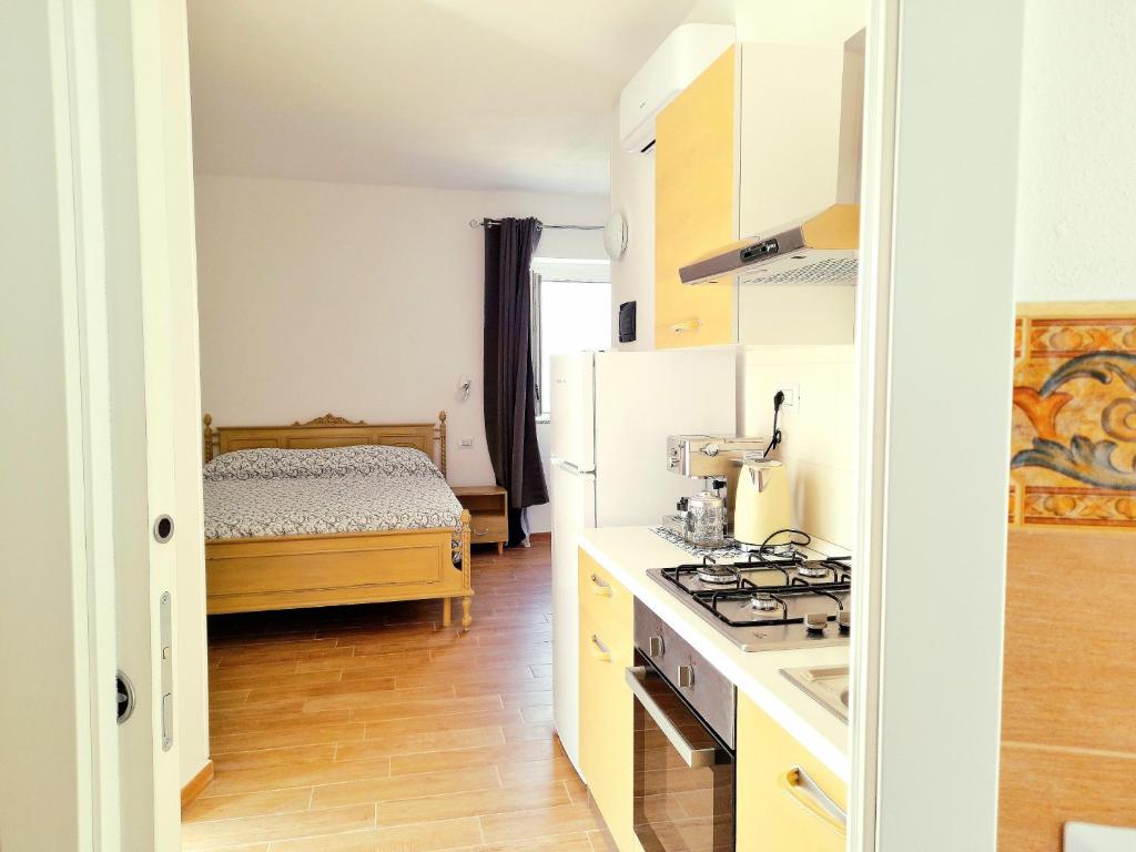 Kuchyň nebo kuchyňský kout v ubytování casa vacanze gioema baunei