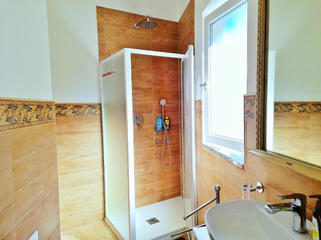 Koupelna v ubytování casa vacanze gioema baunei