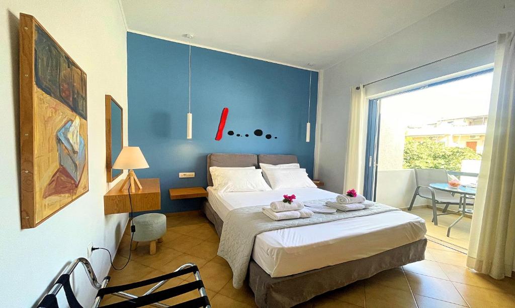 Łóżko lub łóżka w pokoju w obiekcie Art Apartment