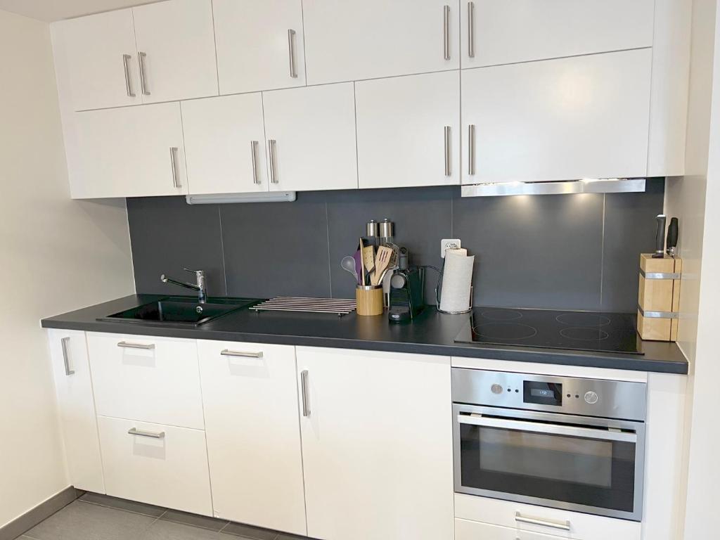Kuchyň nebo kuchyňský kout v ubytování "Petit flocon" Appartement au centre de Verbier
