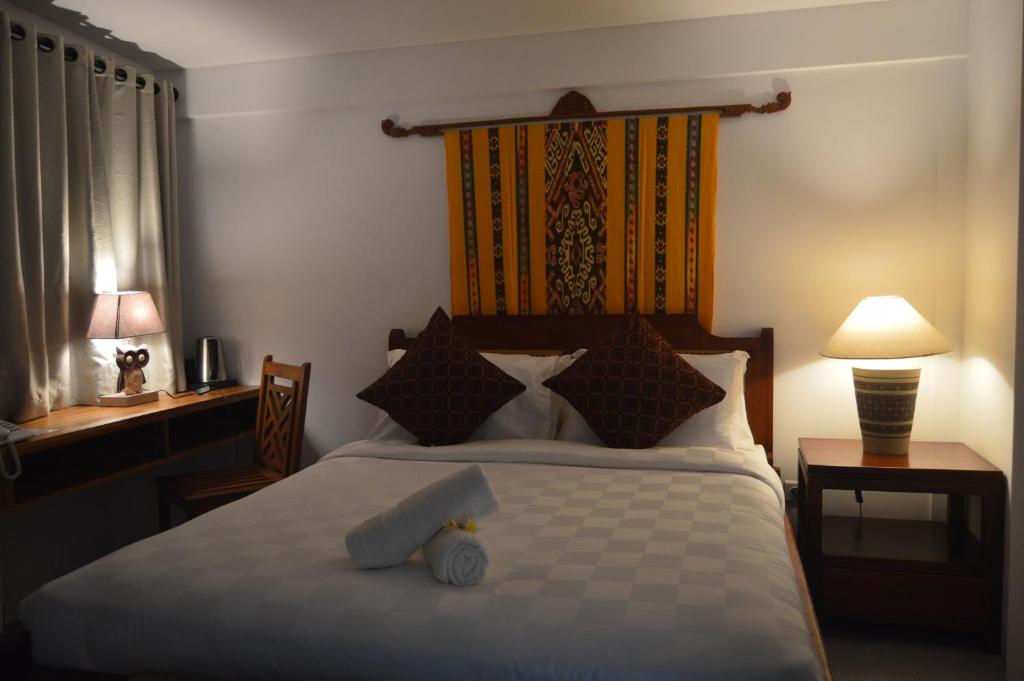 Postel nebo postele na pokoji v ubytování Serenity Private Villa Mas Ubud