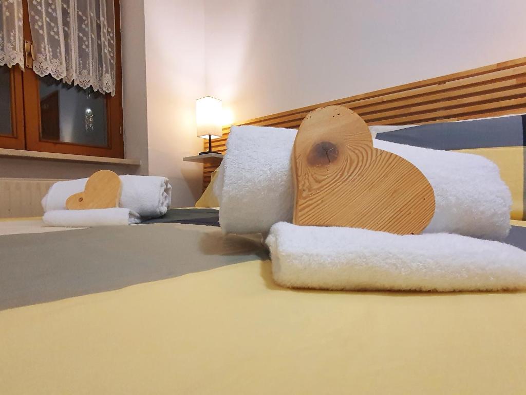 Postel nebo postele na pokoji v ubytování ElvesHome - Alpine Stay Apartments