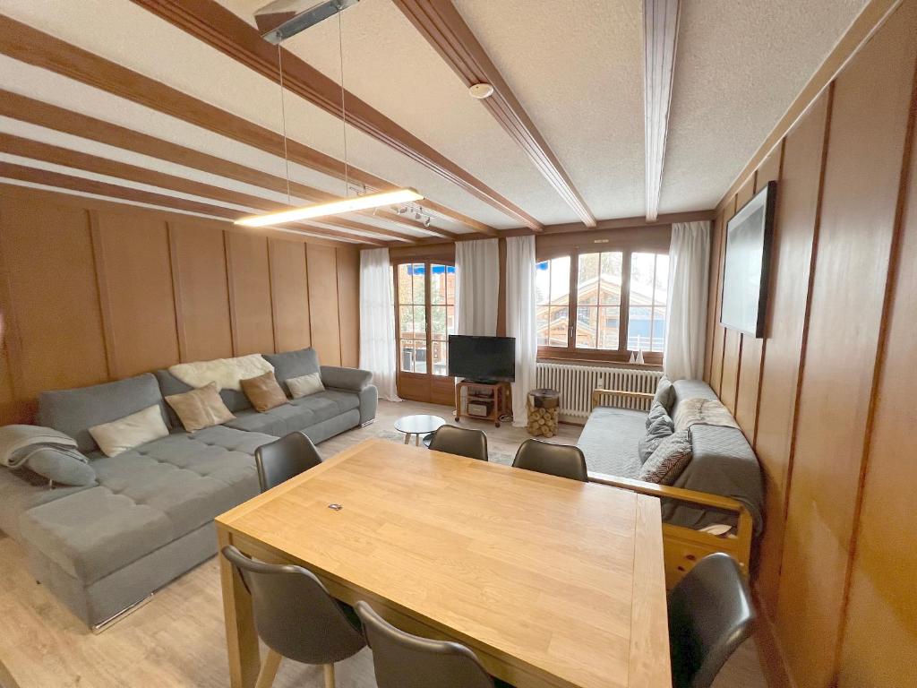TV a/nebo společenská místnost v ubytování "Petit flocon" Appartement au centre de Verbier