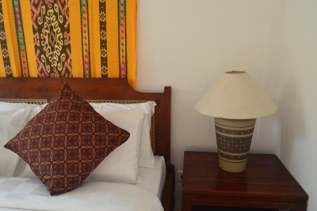 Postel nebo postele na pokoji v ubytování Serenity Private Villa Mas Ubud