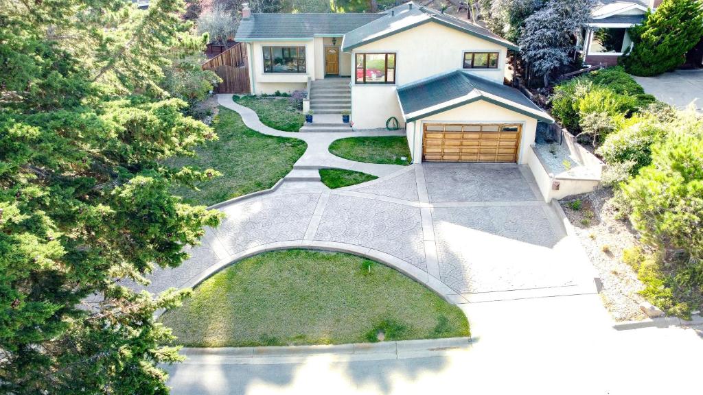 an aerial view of a house with a driveway at Coastal Serene Retreat in the Heart of Monterey! home in Monterey