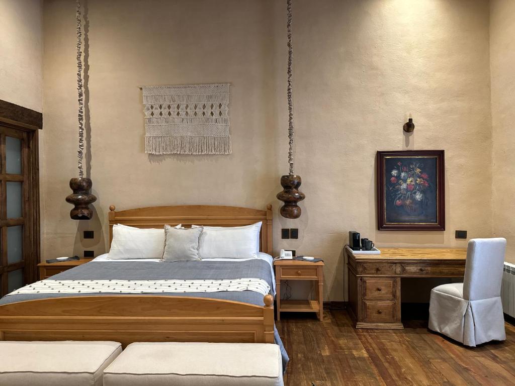 Postel nebo postele na pokoji v ubytování Hotel Ibarra 14