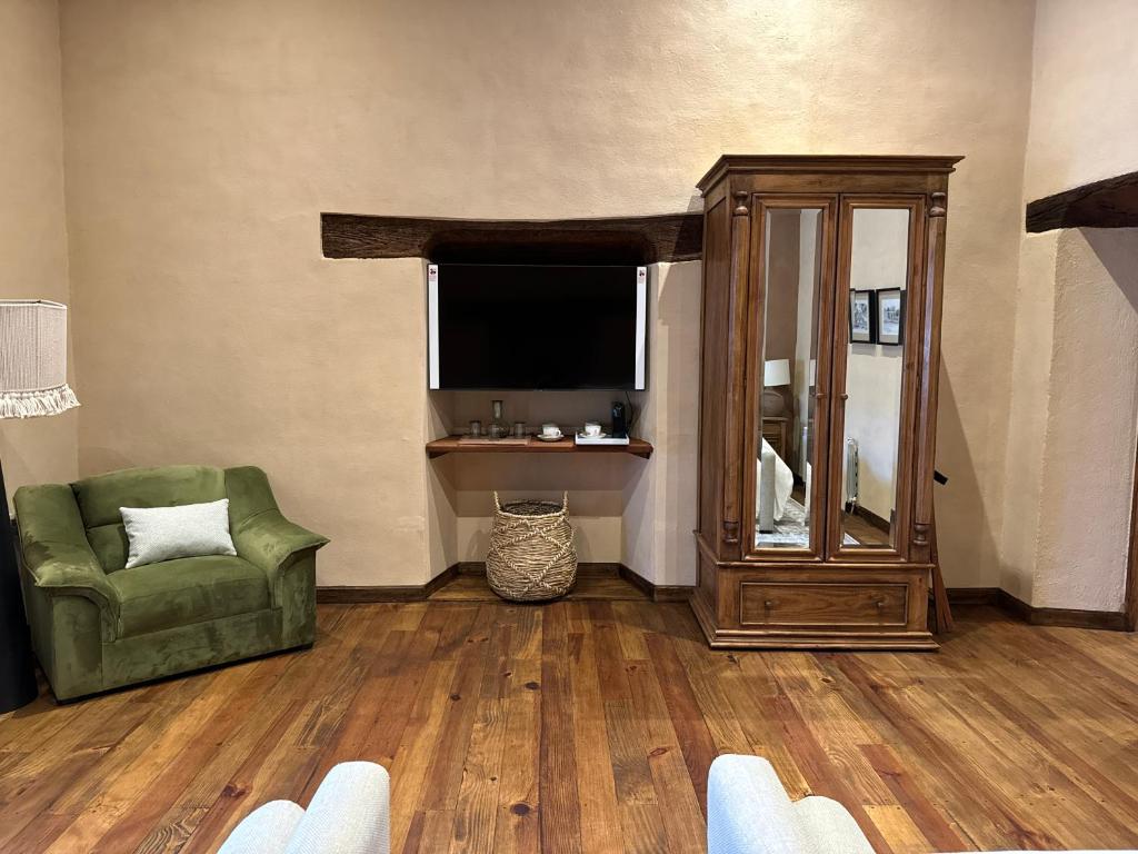 TV a/nebo společenská místnost v ubytování Hotel Ibarra 14