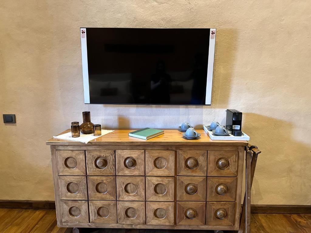 TV a/nebo společenská místnost v ubytování Hotel Ibarra 14