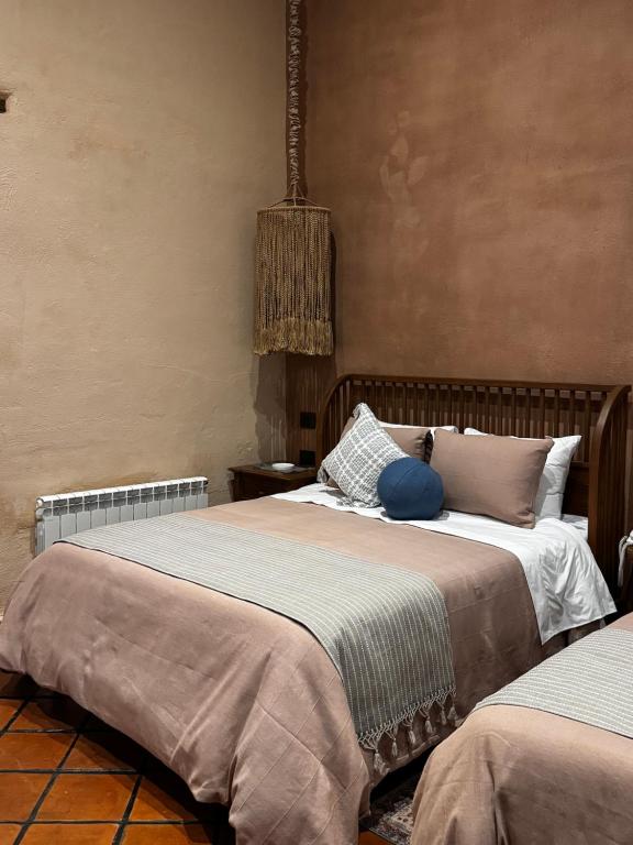 Postel nebo postele na pokoji v ubytování Hotel Ibarra 14
