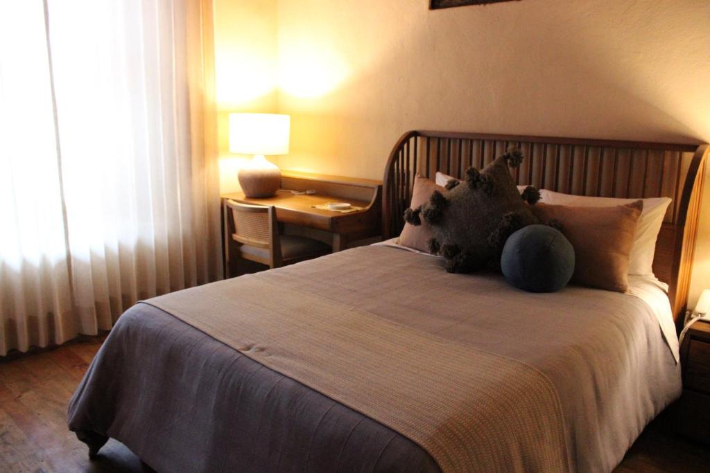 Postel nebo postele na pokoji v ubytování Hotel Ibarra 14