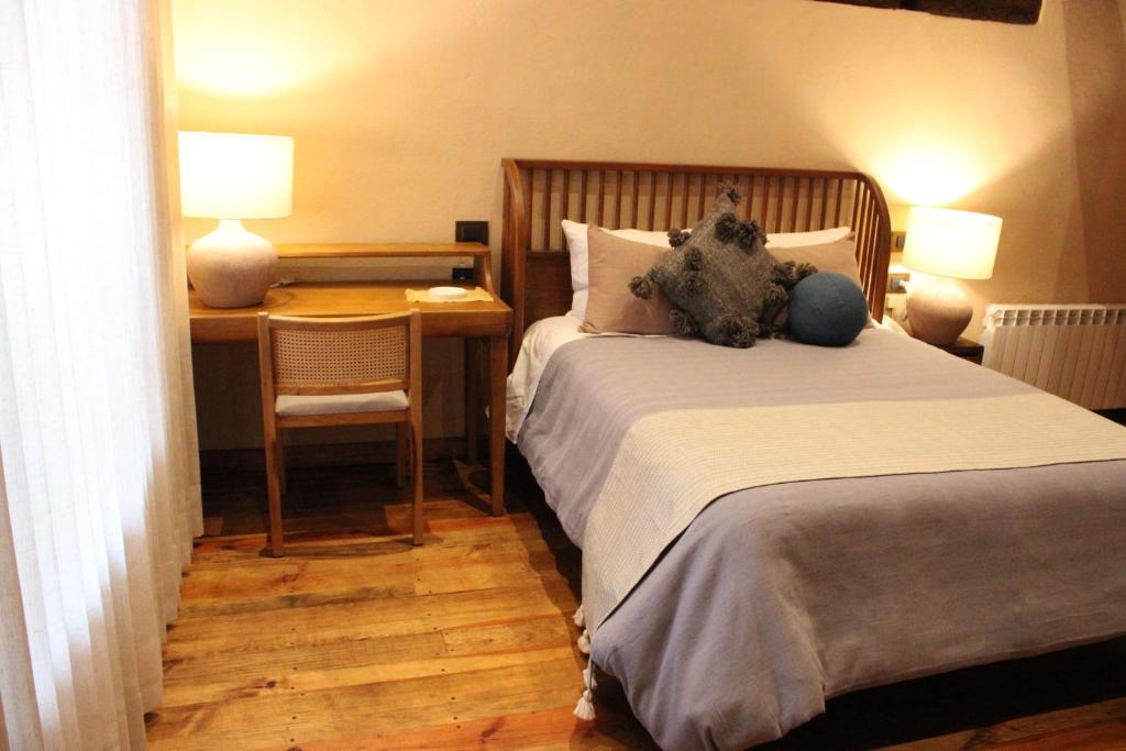 Postel nebo postele na pokoji v ubytování Hotel Ibarra 14