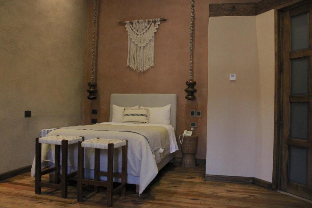 Postel nebo postele na pokoji v ubytování Hotel Ibarra 14