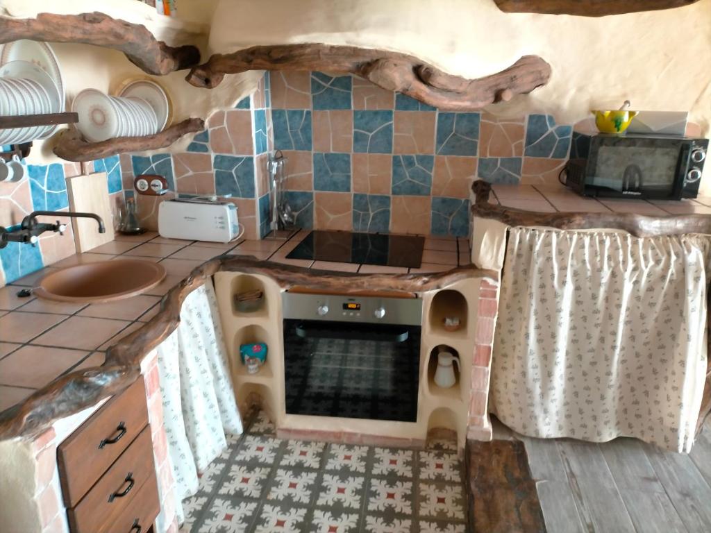 Kuchyň nebo kuchyňský kout v ubytování Casa Rural tía Salomé
