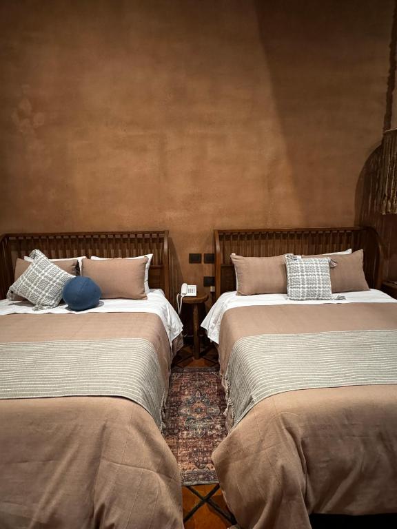 Postel nebo postele na pokoji v ubytování Hotel Ibarra 14