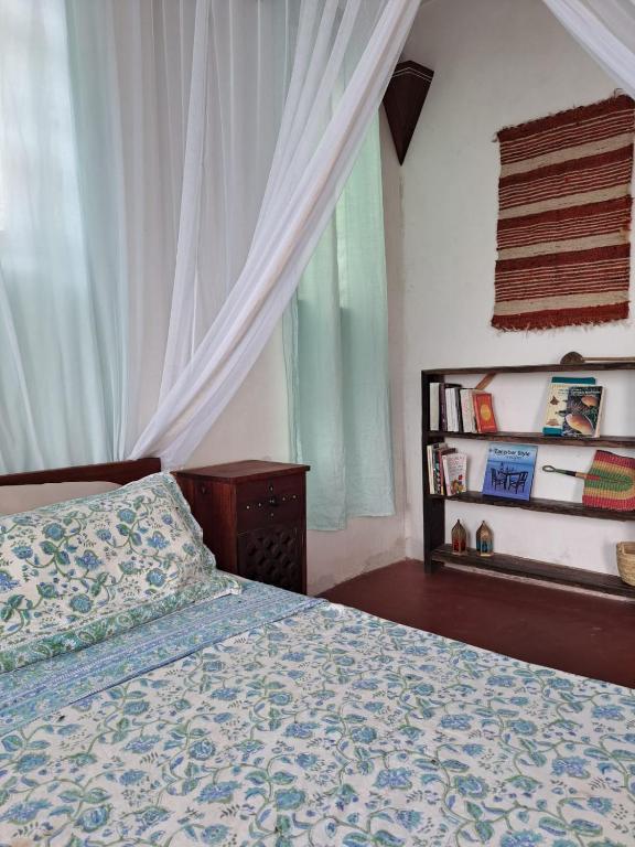 Postel nebo postele na pokoji v ubytování Pwani House - Lamu Seafront