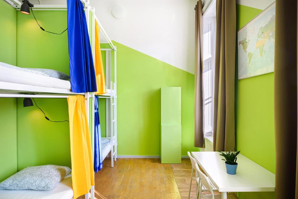 Postel nebo postele na pokoji v ubytování Avenue Hostel