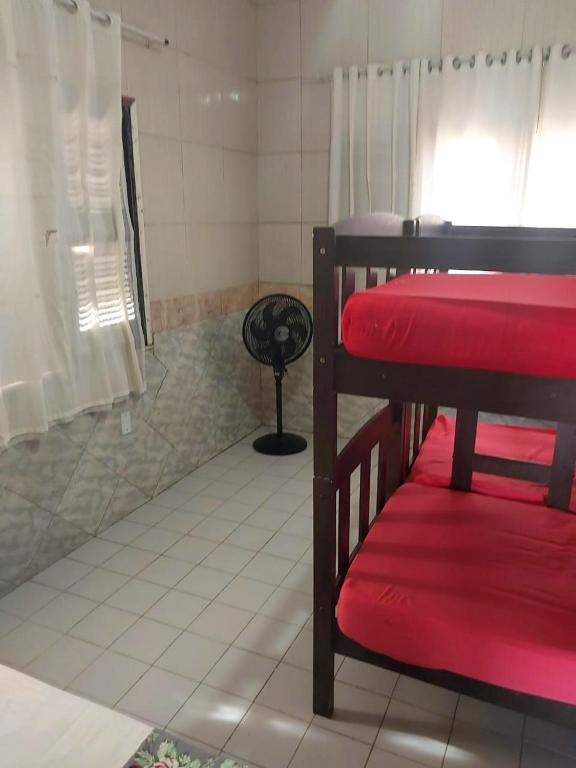 Postel nebo postele na pokoji v ubytování Pousada e Hostel Lua de Tomate