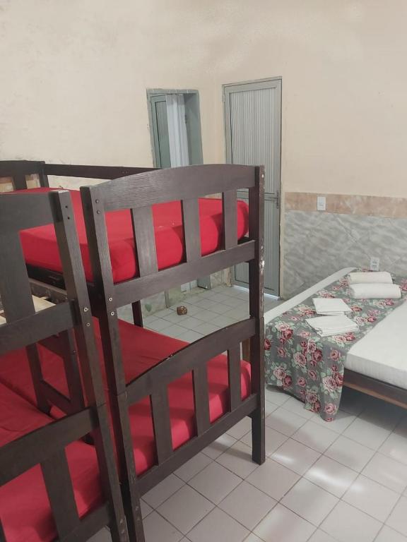 Postel nebo postele na pokoji v ubytování Pousada e Hostel Lua de Tomate