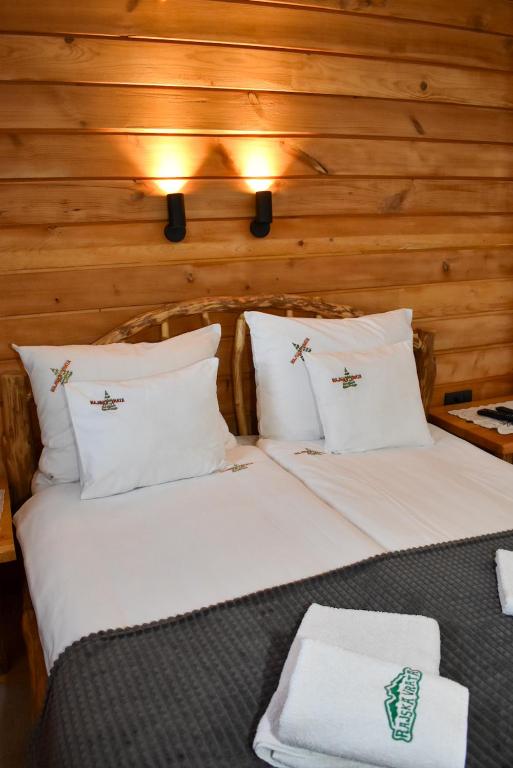 Postel nebo postele na pokoji v ubytování Hotel Rajska Vrata