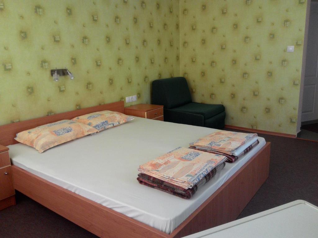 Postel nebo postele na pokoji v ubytování South Beach Hotel