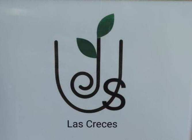 a musical treble clef with a leaf on it at JS crecer in San Sebastián de la Gomera