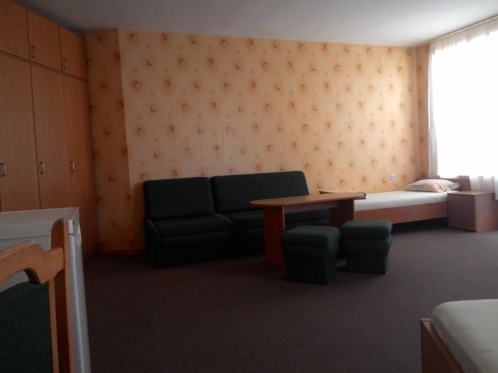 Postel nebo postele na pokoji v ubytování South Beach Hotel