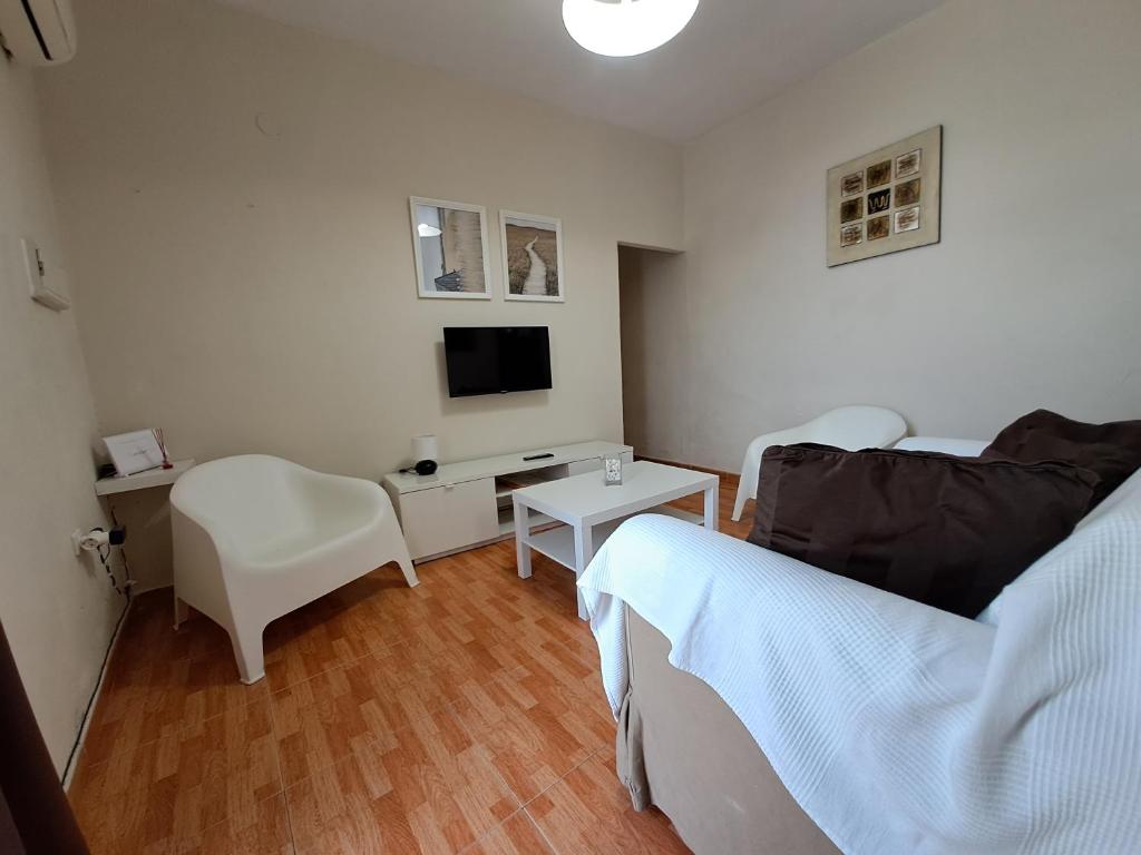 A bed or beds in a room at Apartamento Centro Jerez Carbón