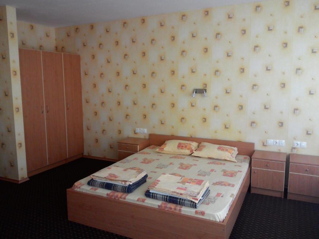 Postel nebo postele na pokoji v ubytování South Beach Hotel