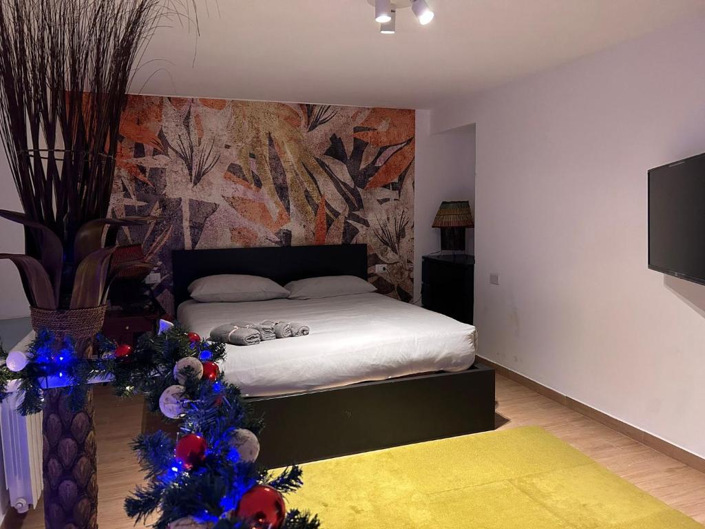 Postel nebo postele na pokoji v ubytování Petite Maison