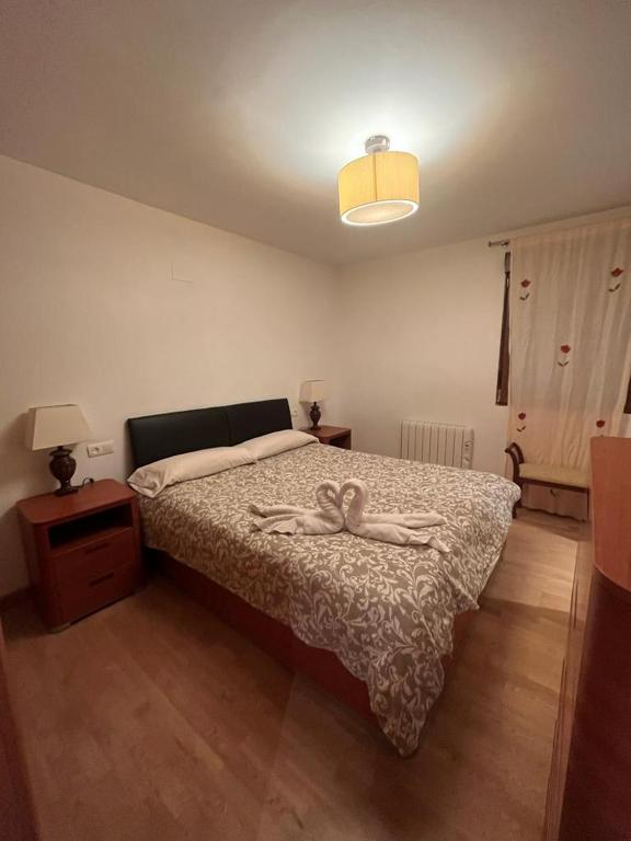 Postel nebo postele na pokoji v ubytování SAPORO ELITE