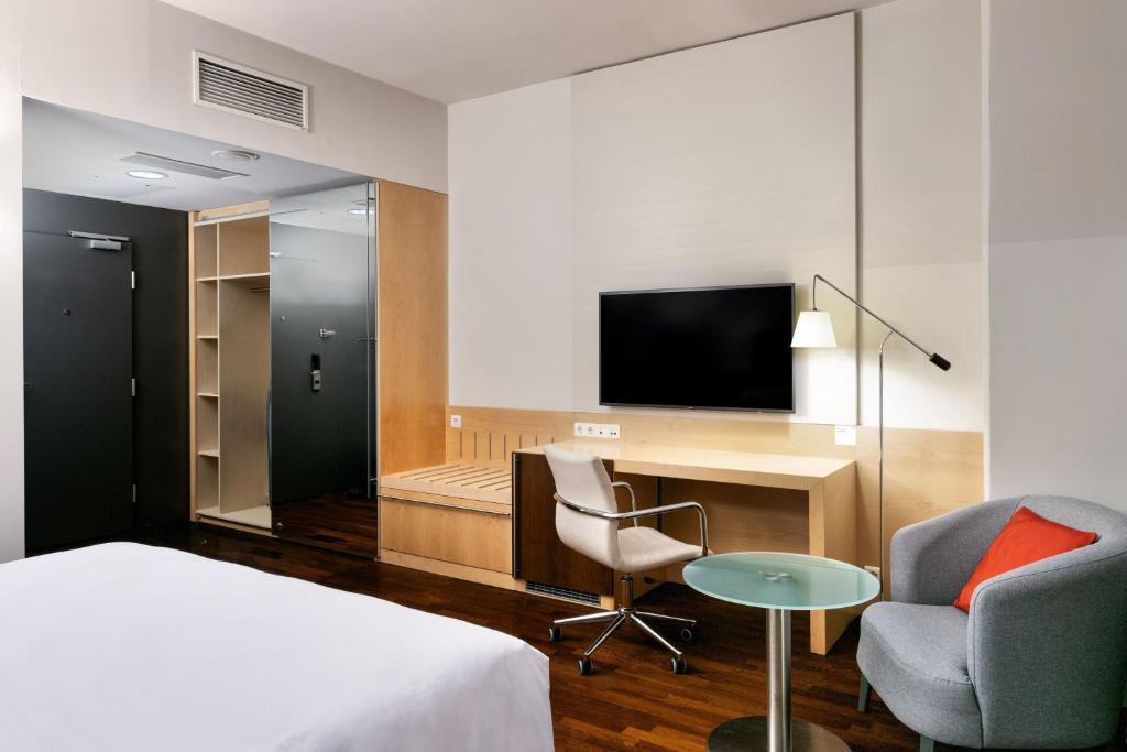 TV a/nebo společenská místnost v ubytování Four Points by Sheraton Ljubljana Mons