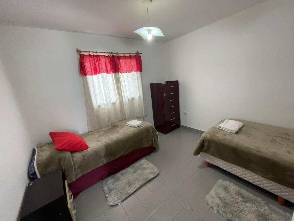 En eller flere senge i et værelse på La casita de sol