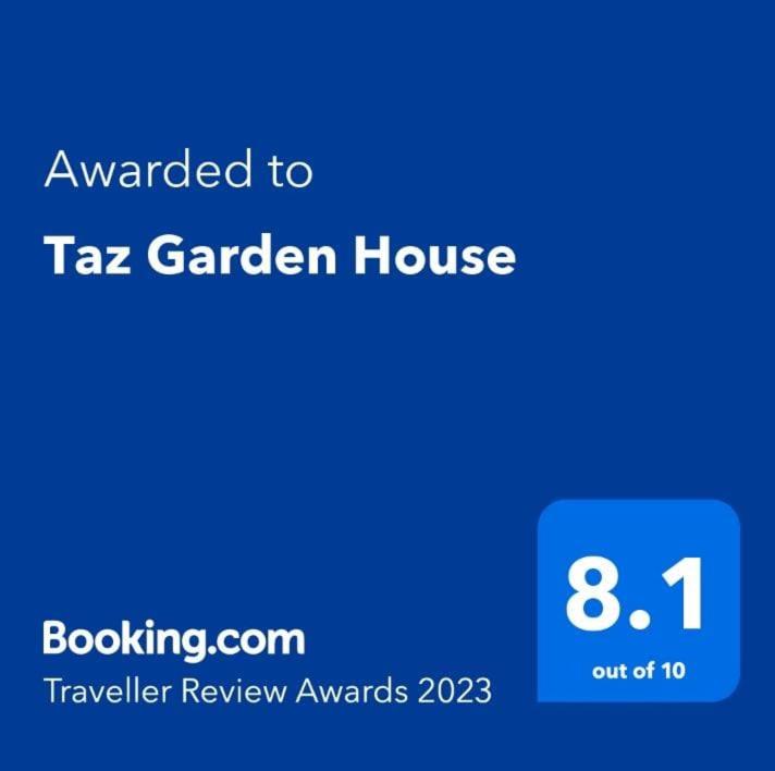 una schermata di una casa giardino taa con il testo di Tax Garden House di Taz Garden House a Dhaka