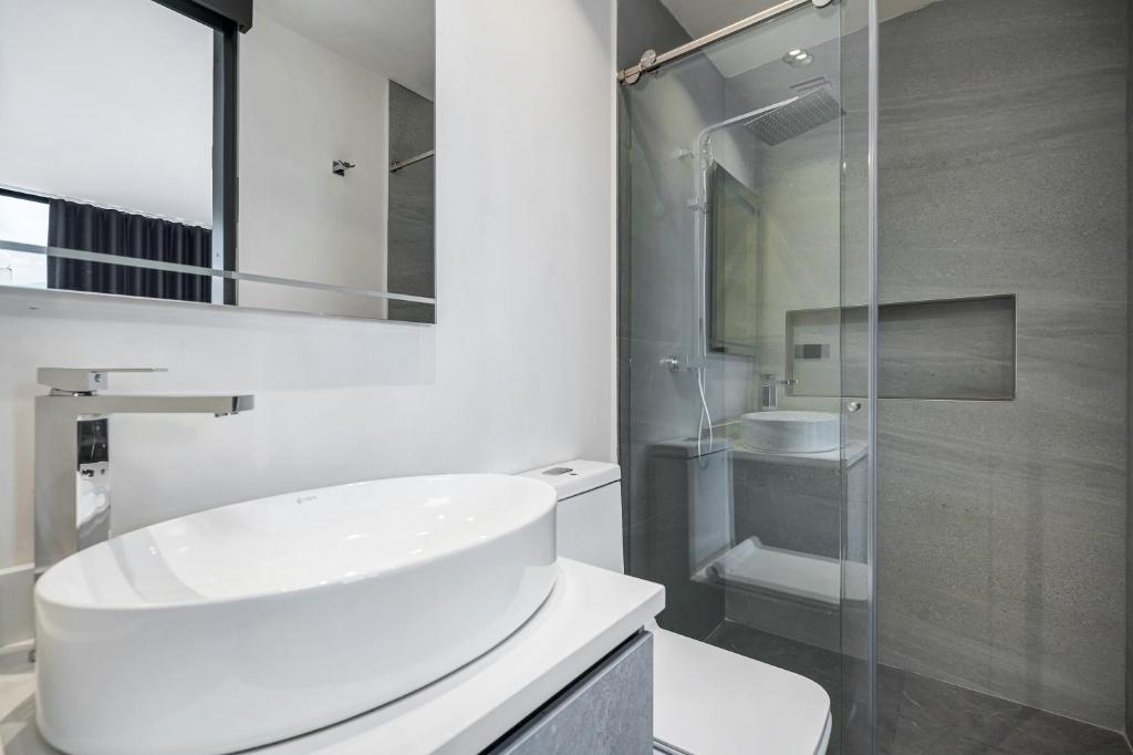 Koupelna v ubytování Apartamentos HOUSY Laureles