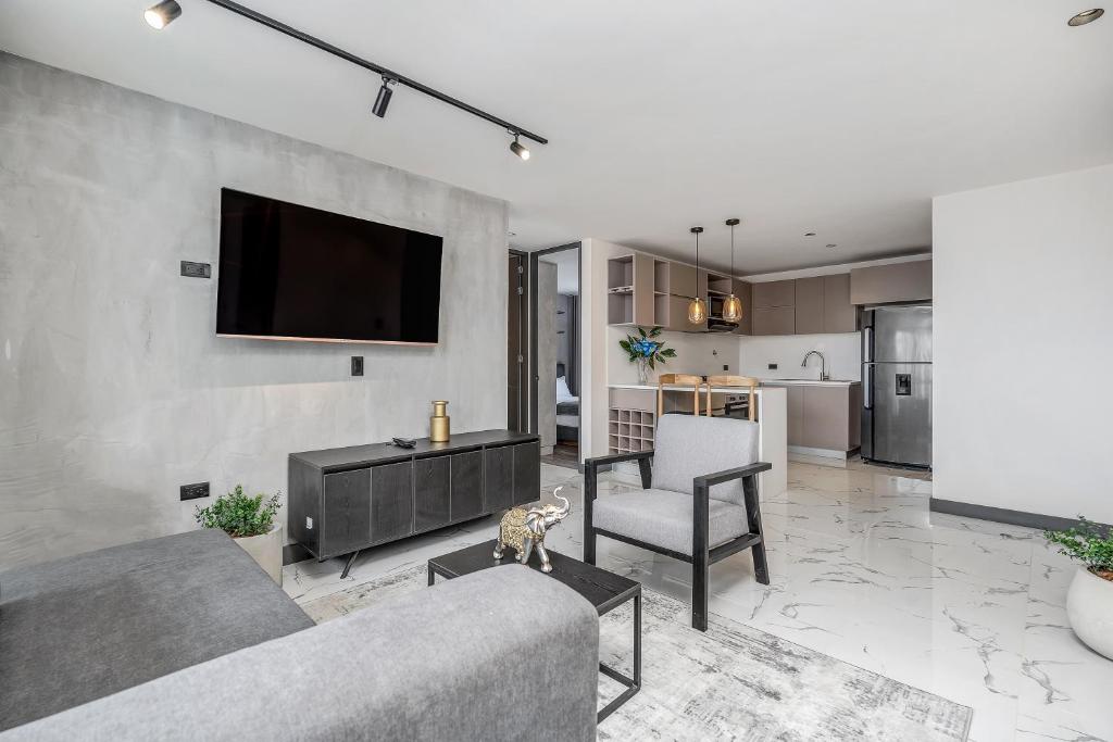 Kuchyň nebo kuchyňský kout v ubytování Apartamentos HOUSY Laureles