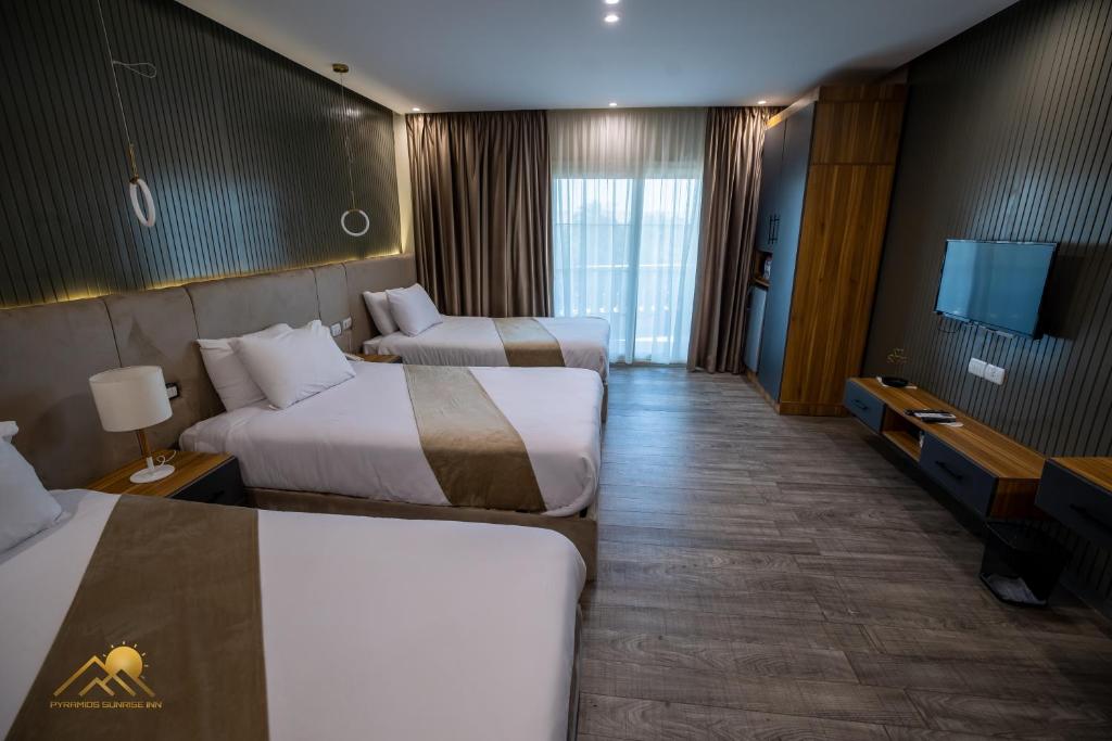 Golden palm sunrise inn - Triple Chambre Avec Balcon