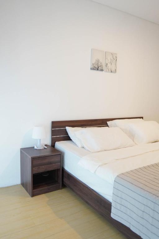 Postel nebo postele na pokoji v ubytování No303