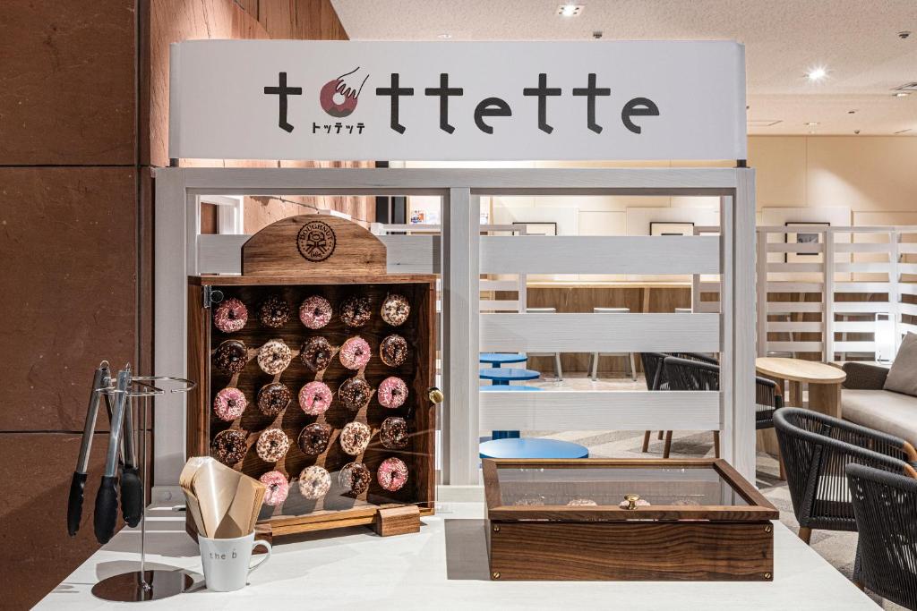 Certifikát, hodnocení, plakát nebo jiný dokument vystavený v ubytování the b kobe