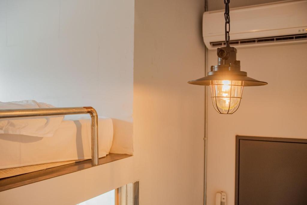 Postel nebo postele na pokoji v ubytování miniinn