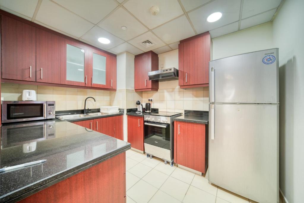 Kuchyň nebo kuchyňský kout v ubytování Rimal 1 - Jumeirah Beach Residence - Mint Stay
