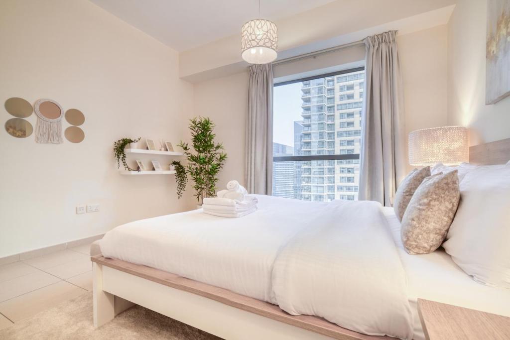 Postel nebo postele na pokoji v ubytování Rimal 1 - Jumeirah Beach Residence - Mint Stay