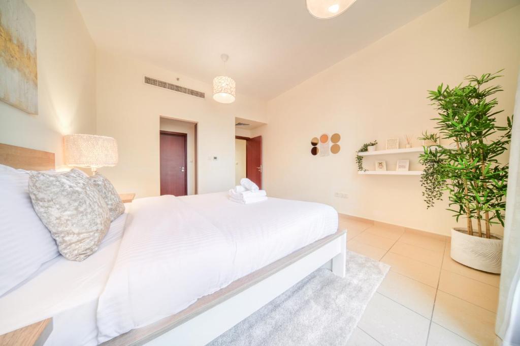 Postel nebo postele na pokoji v ubytování Rimal 1 - Jumeirah Beach Residence - Mint Stay