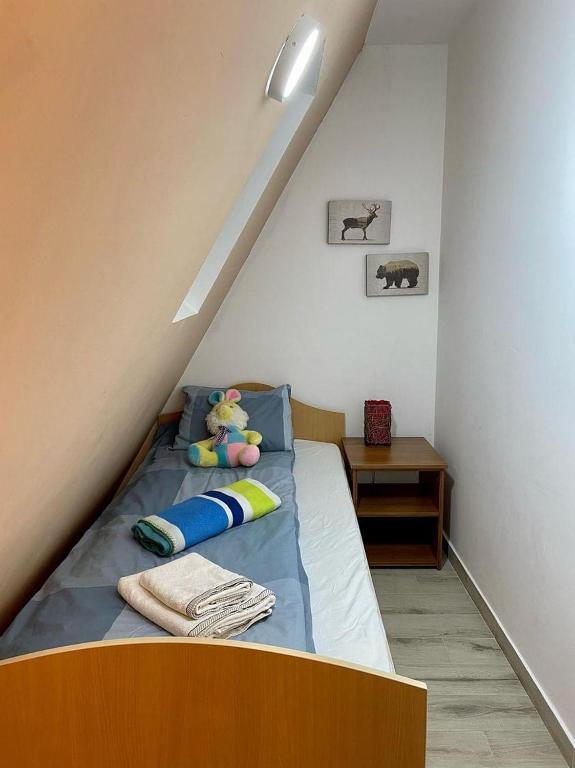 Postel nebo postele na pokoji v ubytování Vila Planinski Mir *Merdzan*